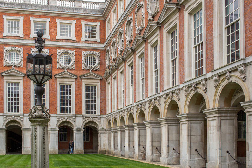 Pre Wedding shoot Hampton Court Palace Couple in Cloisters at Hampton Court Palace