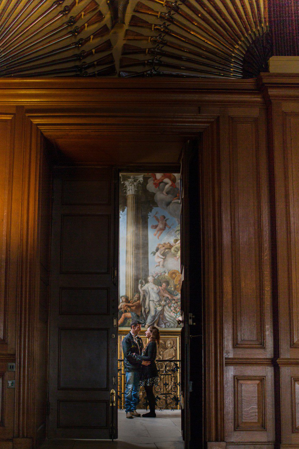 Pre Wedding shoot Hampton Court Palace Couple on Kings Staircase at Hampton Court Palace