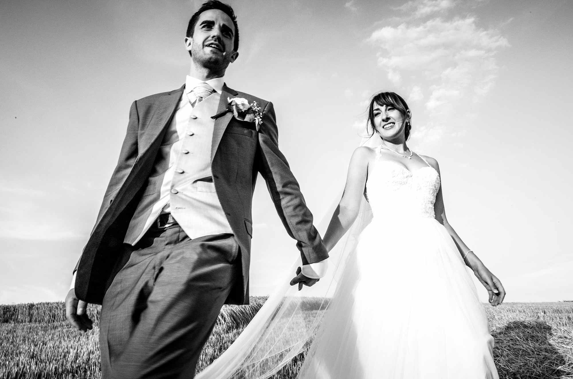Black and White wedding couple portrait shot low down