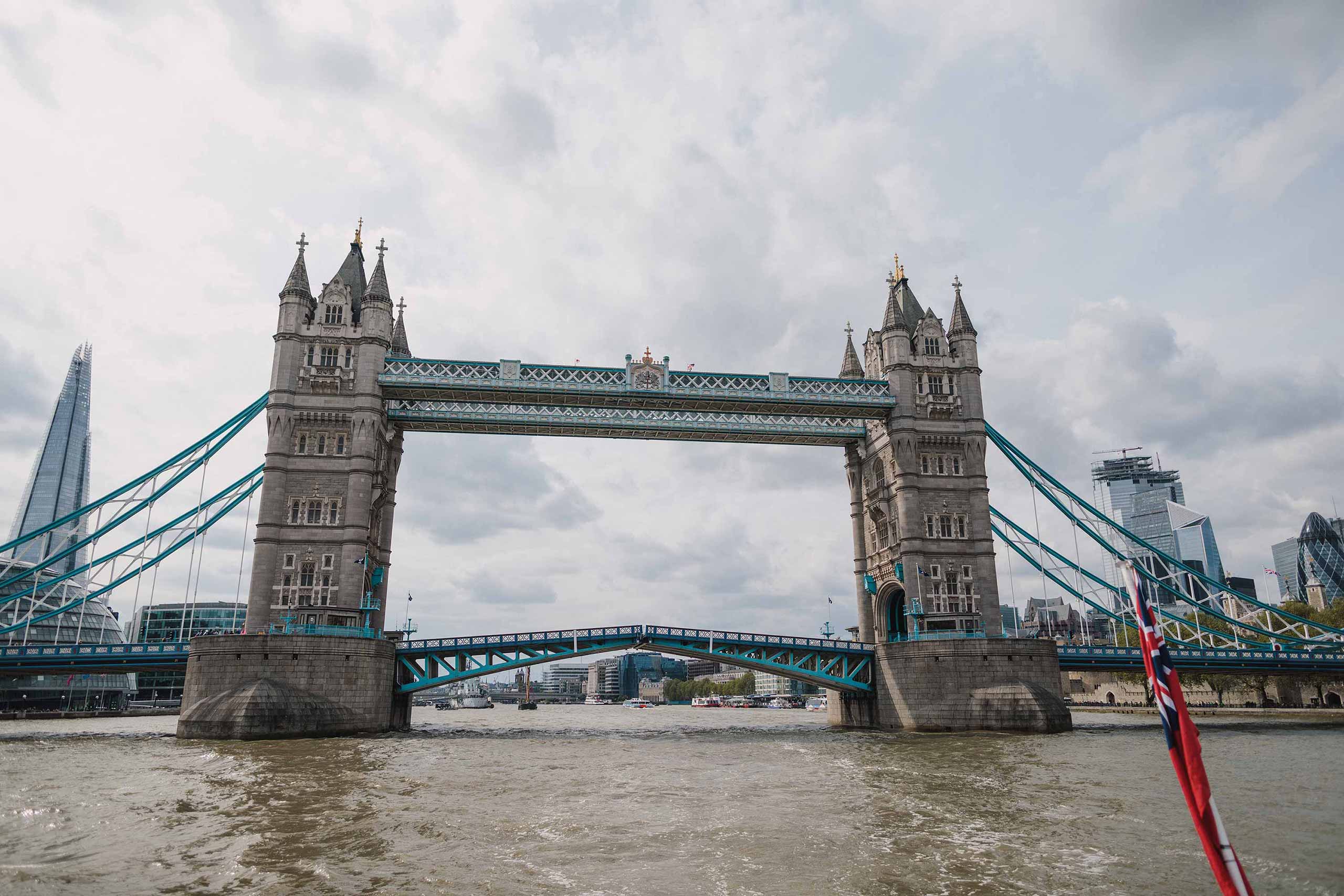 Tower Bridge on the River Thames photographed from a riverboat.