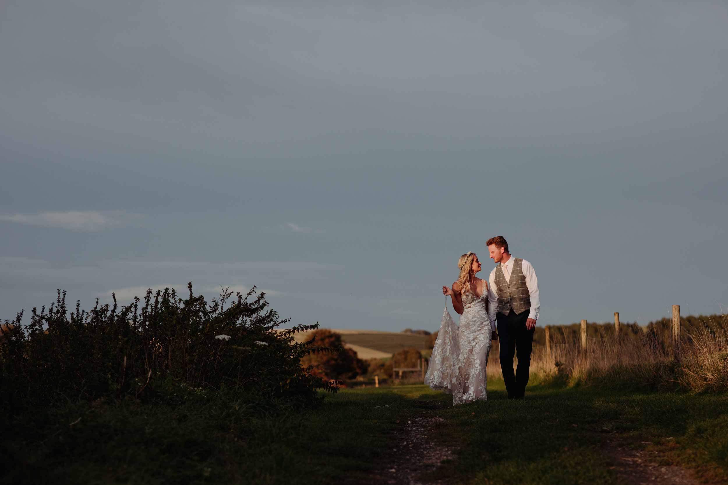 Wedding couple outside at Upwaltham Barns