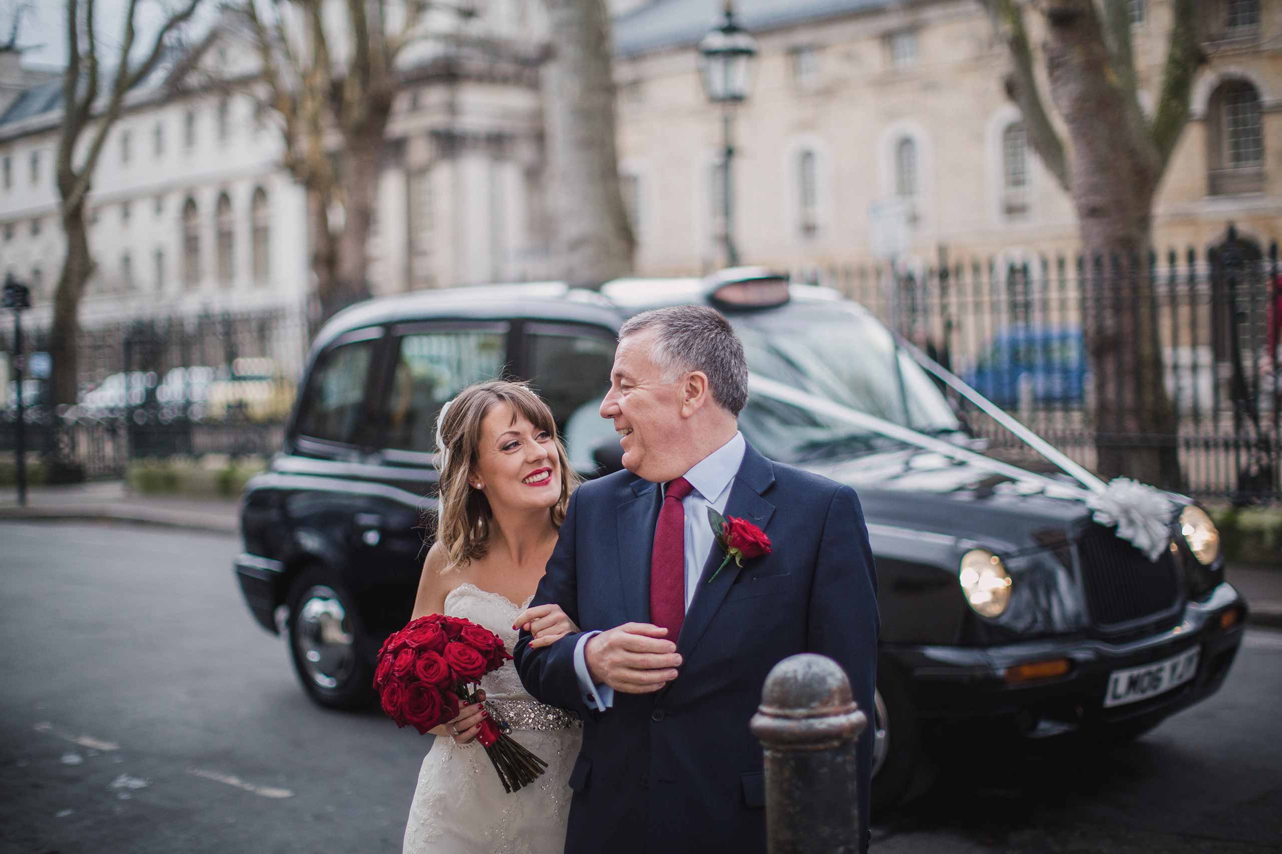 Bride and father of the bride arrive at their Greenwich wedding