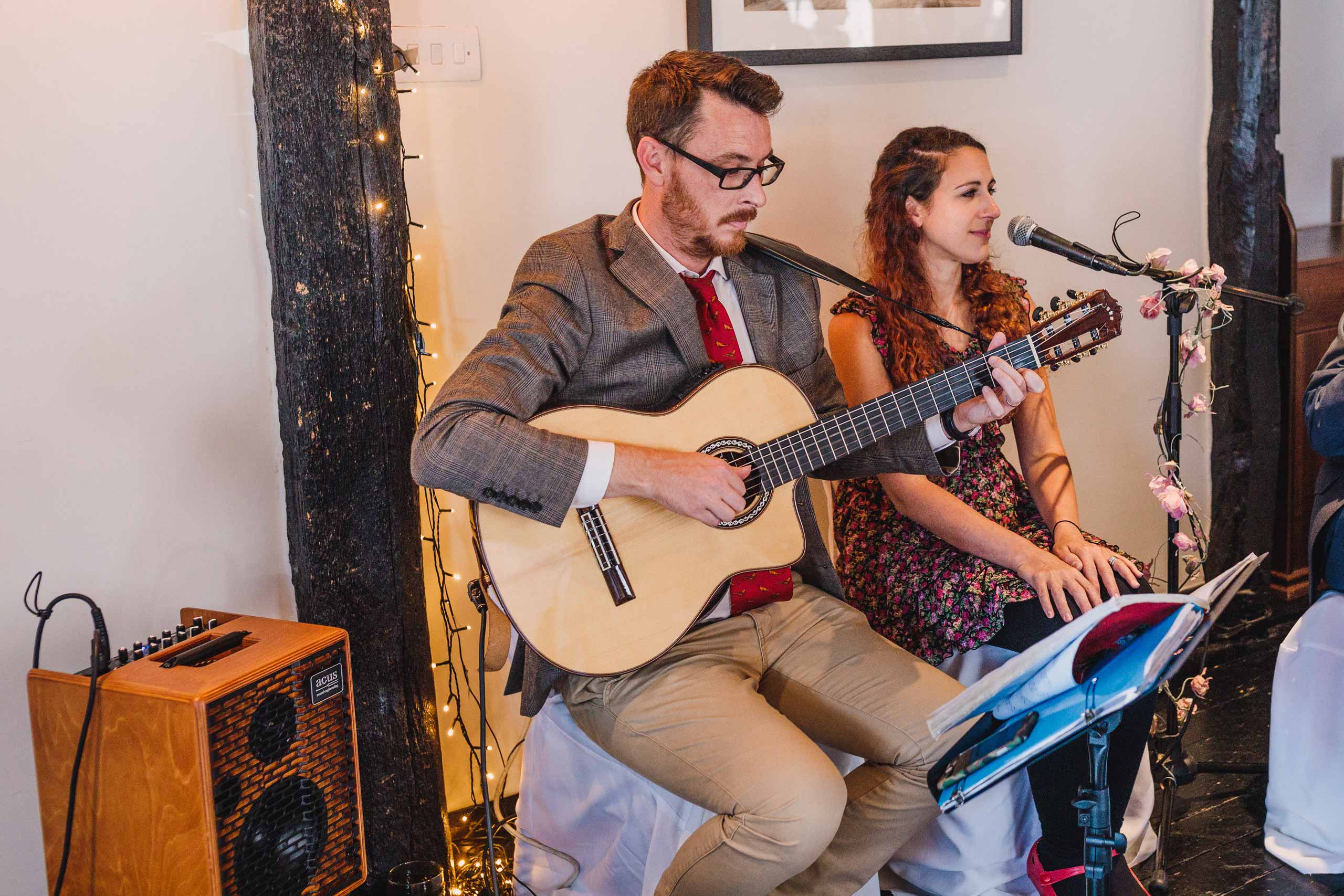 D & L Acoustic Duo singing and playing guitar at an Alfriston wedding 