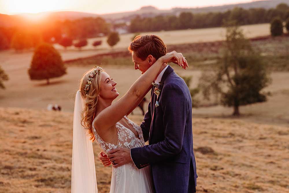 Bride and groom golden hour Cissbury Barns 
