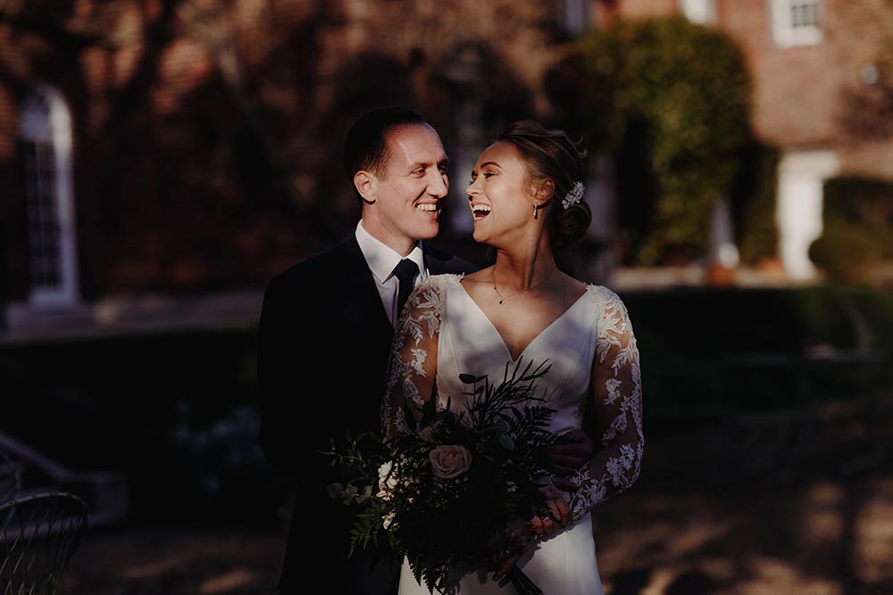 Bride and groom in beautiful winter light at Pelham House Lewes