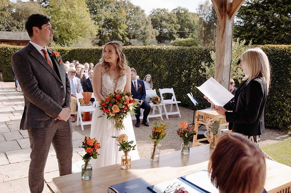 Bride and groom at their outside wedding ceremony at Brookfield Barn